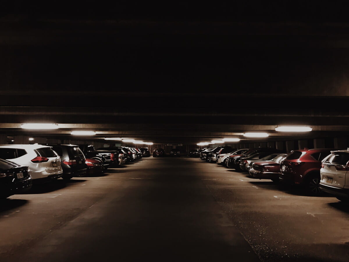 vehicles parked inside parking lot