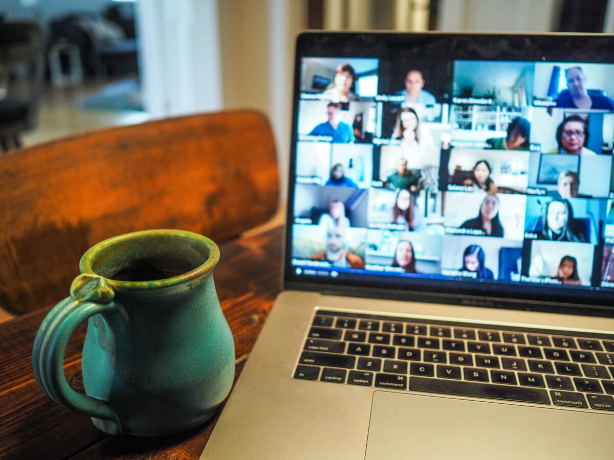 macbook pro displaying group of people.jpg