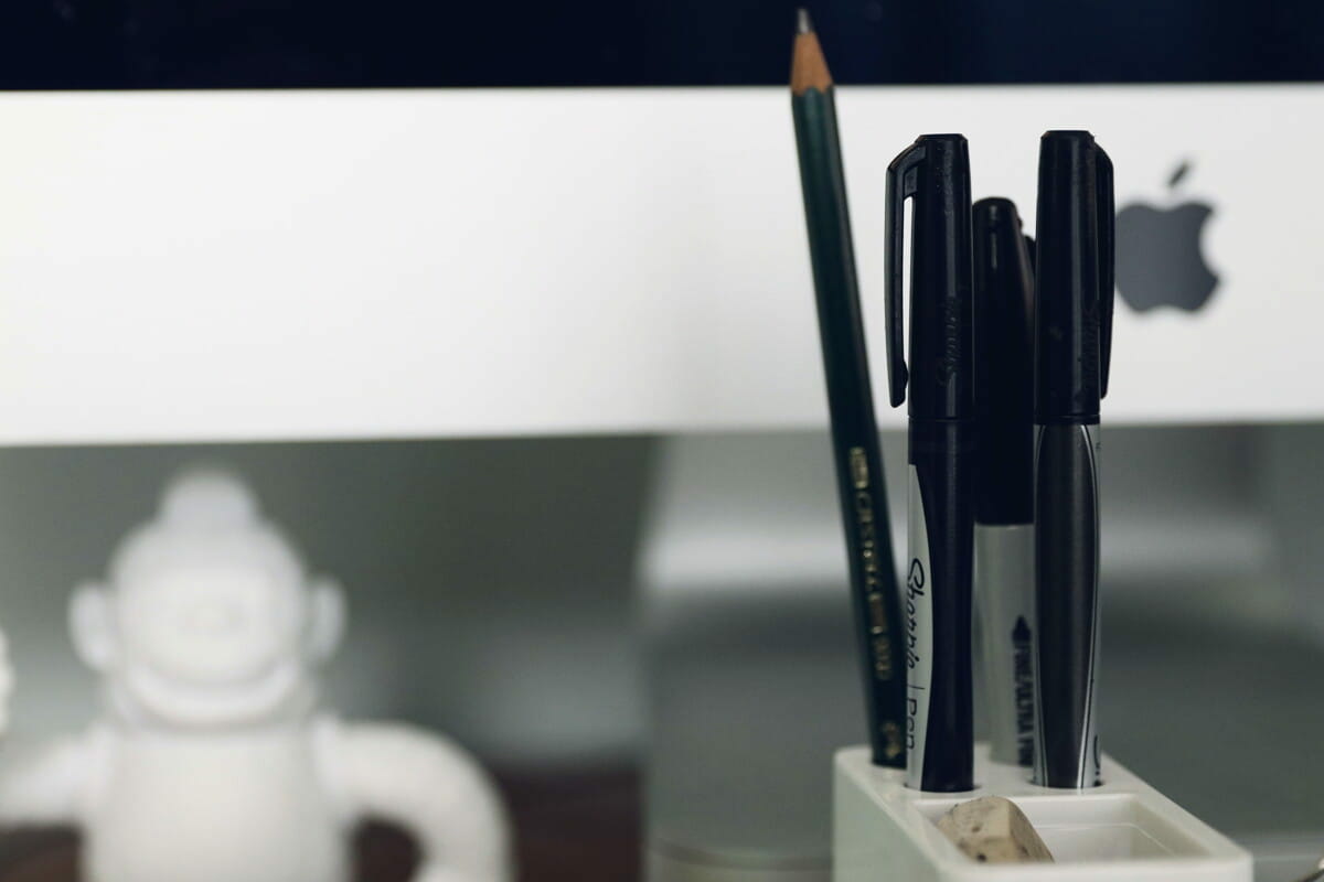 pen and pencil in organizer close-up photography.jpg