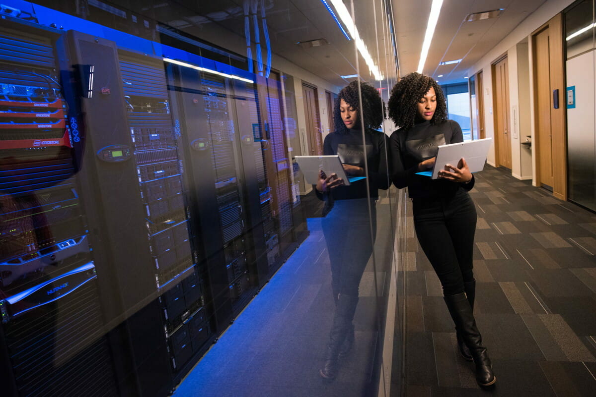 woman in black top using MacBook.jpg